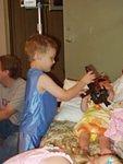 Elijah is showing Mary one of his new toys :)