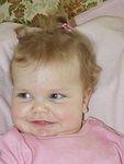 Mamaw put my hair up in my first pig tails!