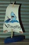 Timothy is ready to race his boat at the Raingutter Regatta!