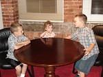 Timmy says "This is an important business meeting, Abigail.  No horsing around!"