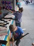 Elijah was going to field strip the rifle and clean it first, but apparently the carnival guy want him to just cock it.