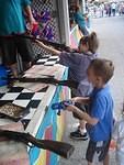 Elijah hit two cups on his first shot!  Apparently he only gets one prize though.  Hmm..