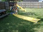 I specifically remember signing a form for my homeowner's insurance stating that my kids will never run on slip-n-slides.  Hmm.