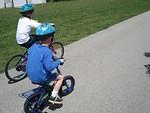 Elijah is a little too big for his bike from last summer.