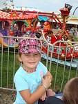 While the boys were off riding big-kid rides.. Abby got to go around and ride all of the fun girlie stuff :)