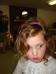 Abby is munching on a strawberry :)  Err.. oh, wait.. was that Play Dough?