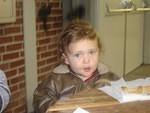 Isaiah looks like a little pilot with his bomber jacket on.