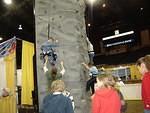 Elijah is in the middle.  He tried climbing up like 4 times!